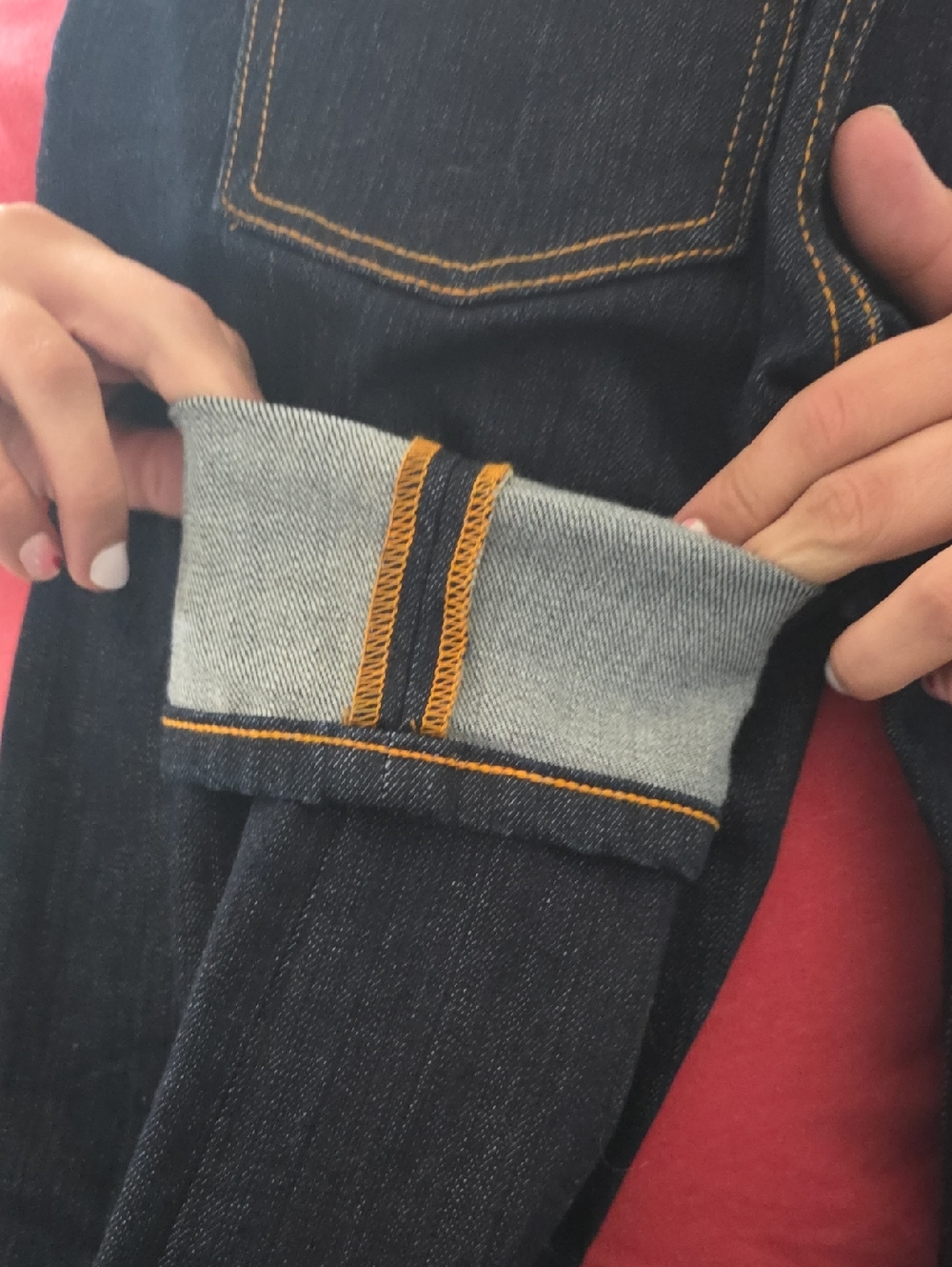 Nudie Jeans Dark Indigo Denim with Orange Topstitching
